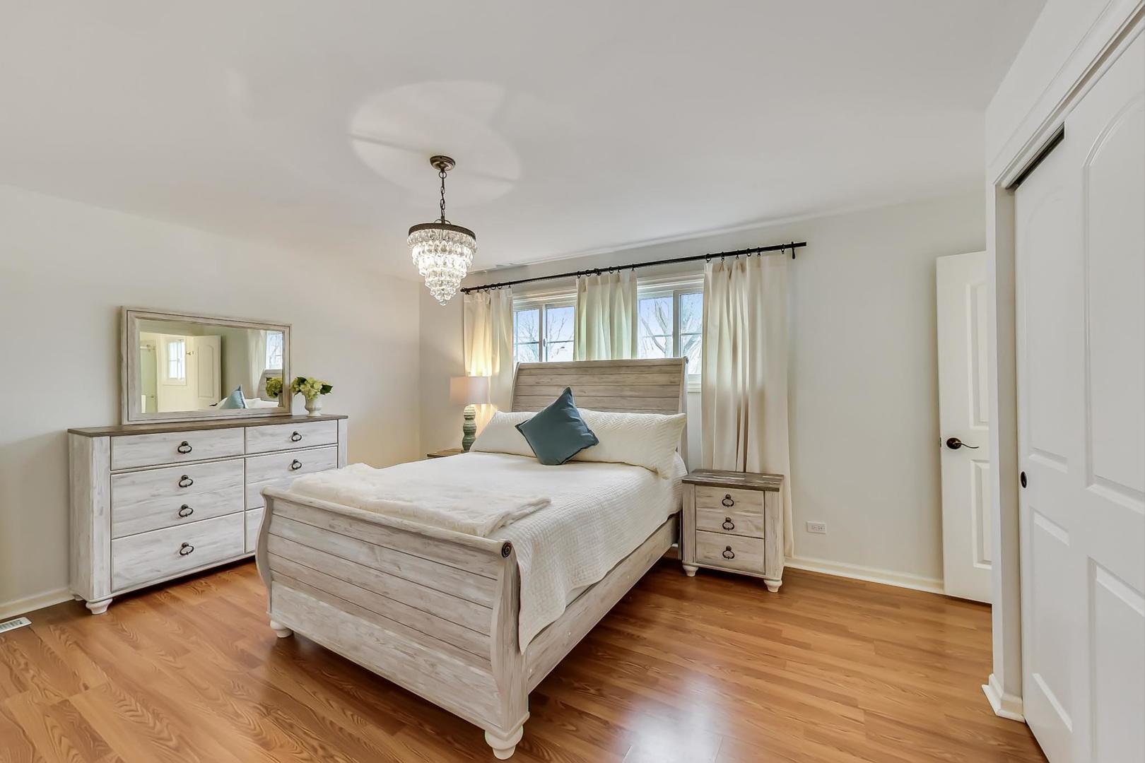 1920 Barberry Road Northbrook, IL 60062 - Photo 11 of 24 a bedroom with a bed and a dresser