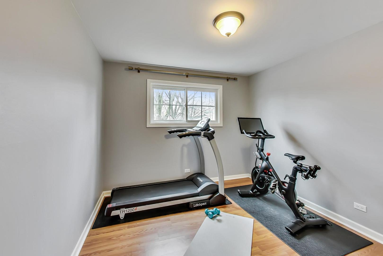 1920 Barberry Road Northbrook, IL 60062 - Photo 16 of 24 a room with gym equipment and windows