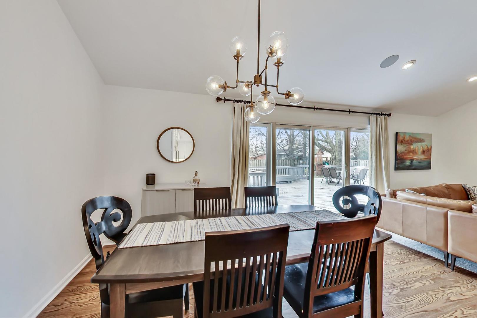 1920 Barberry Road Northbrook, IL 60062 - Photo 7 of 24 a view of a dining room and hall with furniture