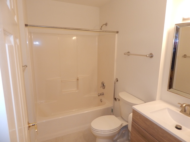 620 Downs Loop Clemson, SC 29631 - Photo 12 of 35 A modern vanity pairs seamlessly with a classic tub in this clean bathroom space.