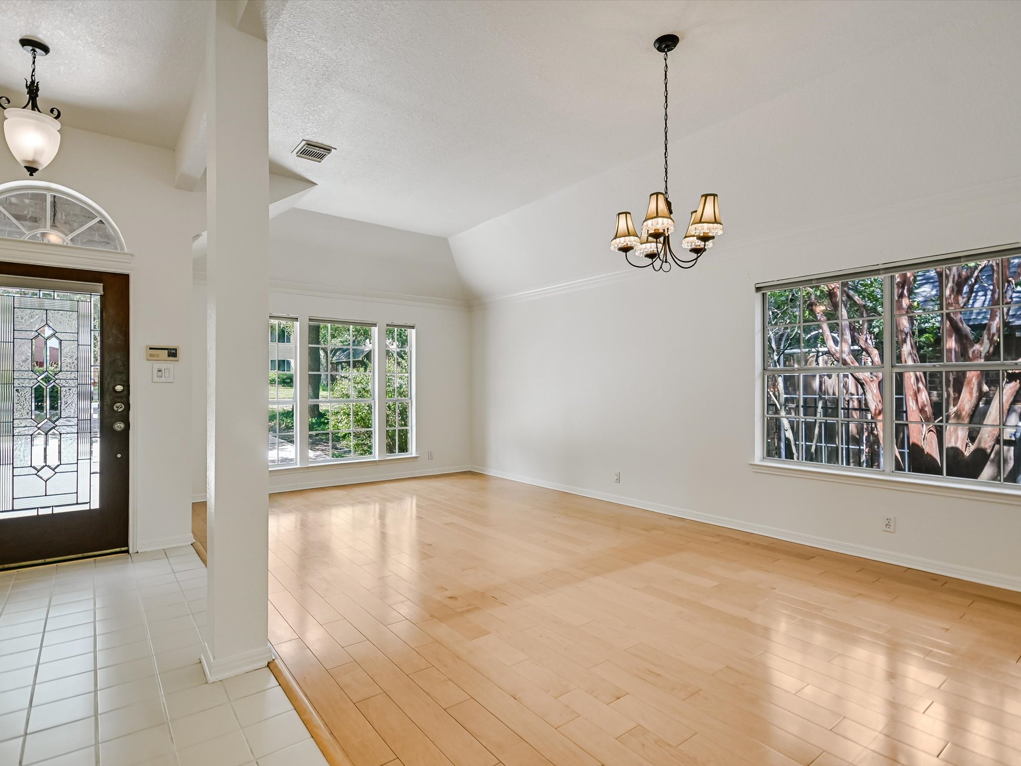 10817 Redmond Road Austin, TX 78739 - Photo 2 of 21 Inside your will find multiple living and dining areas that are easily adjustable to your modern needs.