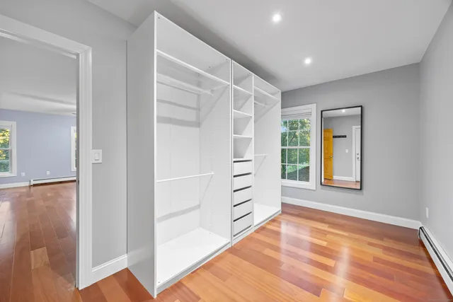 a view of walk in closet with window