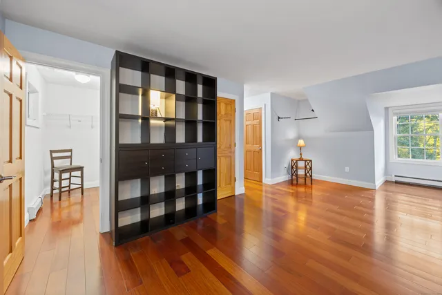 a view of livingroom with hardwood and furniture