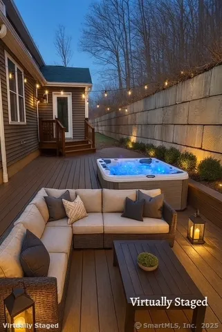 a projector room with furniture and wooden floor