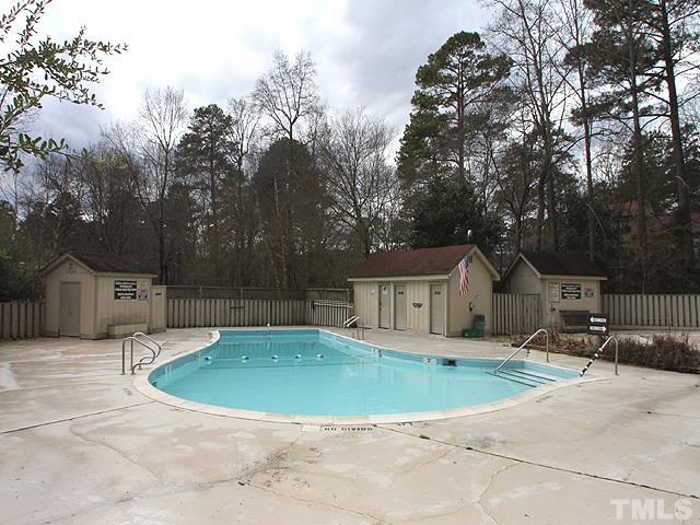5853 Branchwood Road Raleigh, NC 27609 - Photo 22 of 22 a view of a house with a yard
