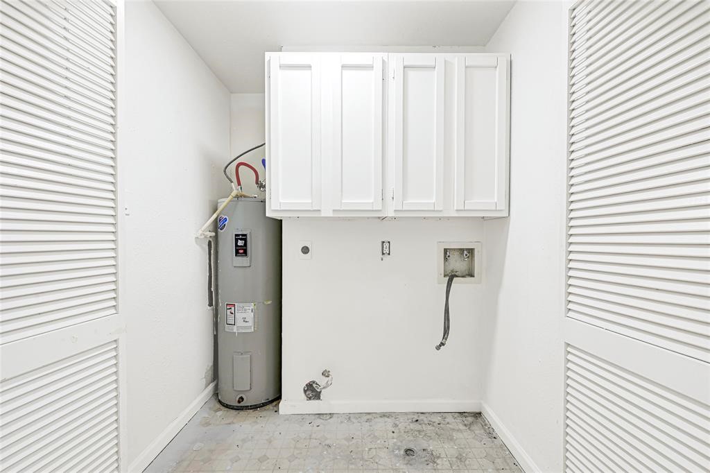 8302 Country Wind Lane Houston, TX 77040 - Photo 18 of 20 a view of cabinets