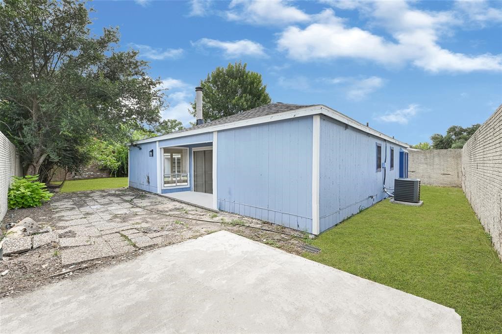 8302 Country Wind Lane Houston, TX 77040 - Photo 20 of 20 a view of a backyard of the house