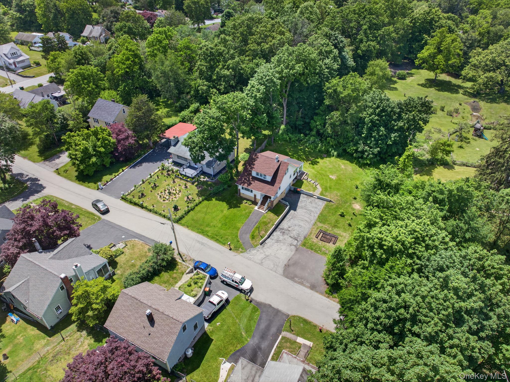 7 Walnut Street Poughkeepsie, NY 12601 - Photo 3 of 30 Surrounded by a quiet neighborhood setting with minimal traffic, the property offers a sense of privacy and tranquility while still being conveniently located near everyday amenities.