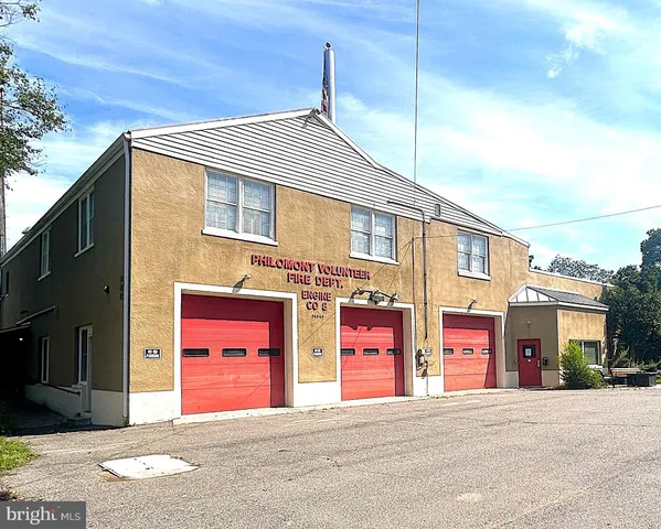 a front view of a house with a garage