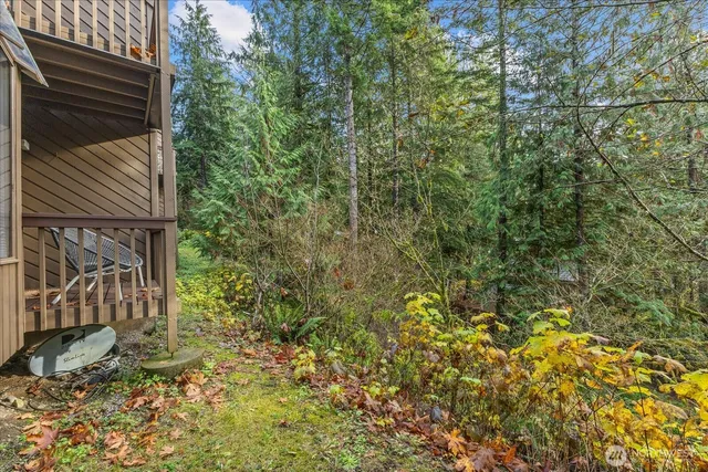 a view of a house with a tree