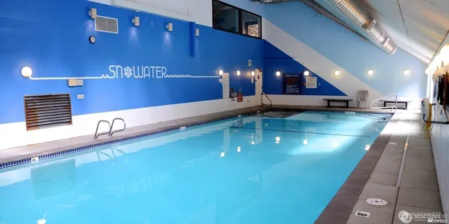 a view of a swimming pool and outdoor space