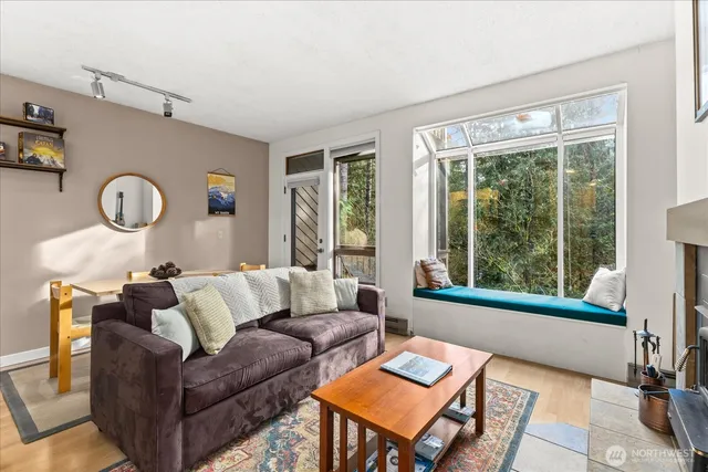 a living room with furniture and a window