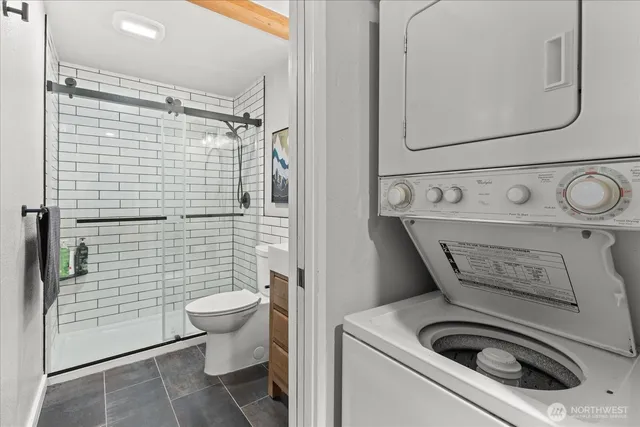 a bathroom with a toilet and a sink