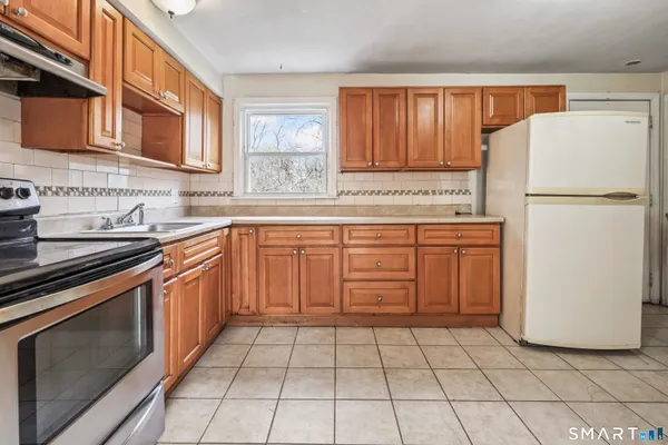 $269,000 | 71 Sunshine Circle, Bridgeport, CT 06606
