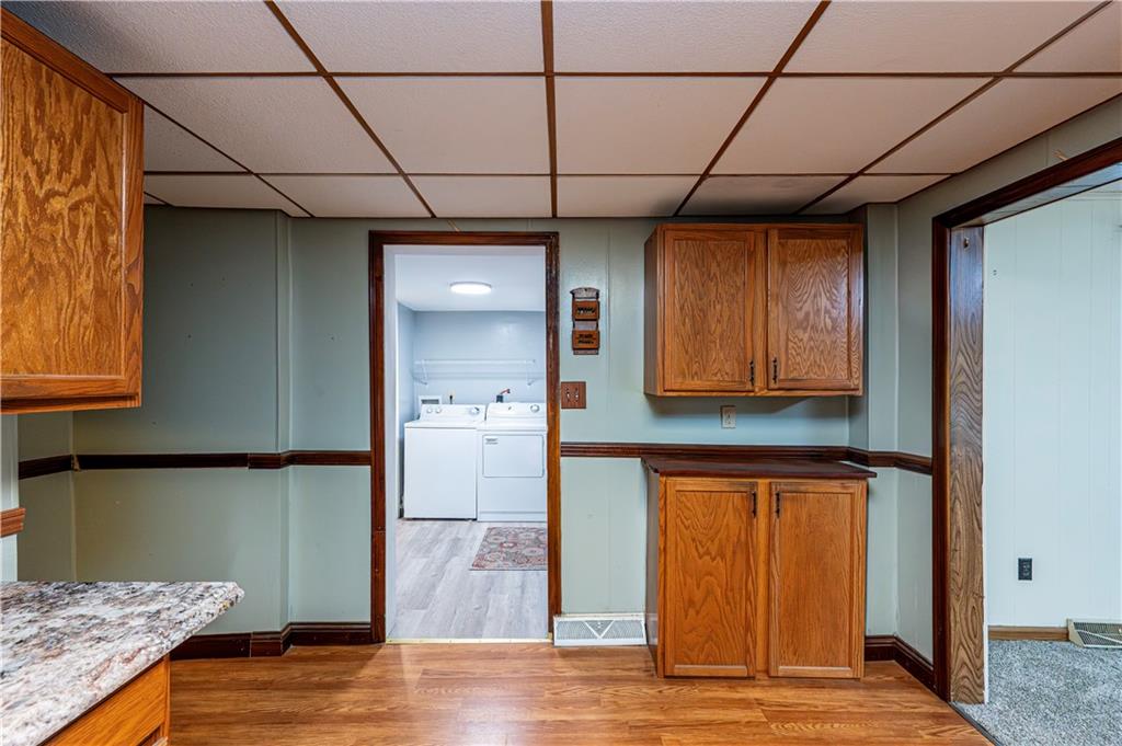 4 Miller Street Latrobe, PA 15650 - Photo 18 of 39 a view of a refrigerator in kitchen and wooden floor