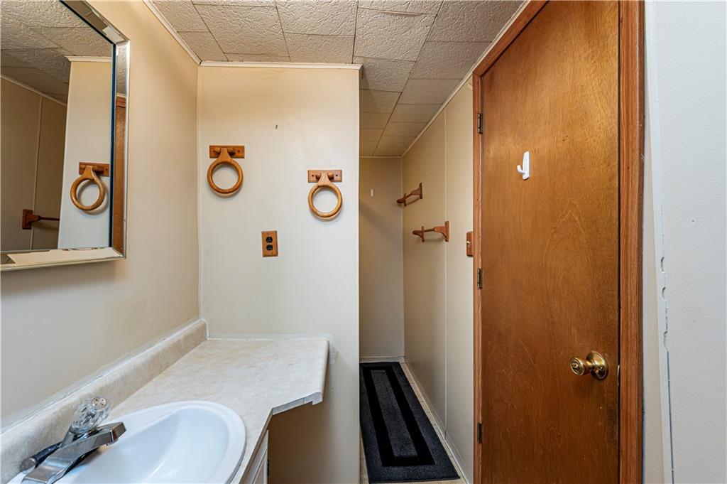 4 Miller Street Latrobe, PA 15650 - Photo 35 of 39 a bathroom with a sink and a mirror