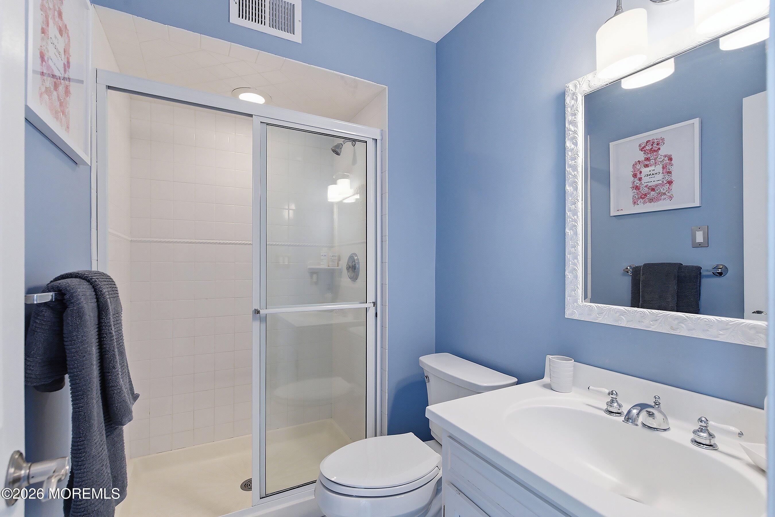 60 Wyckham Road Spring Lake Heights, NJ 07762 - Photo 18 of 26 a bathroom with a sink toilet and shower