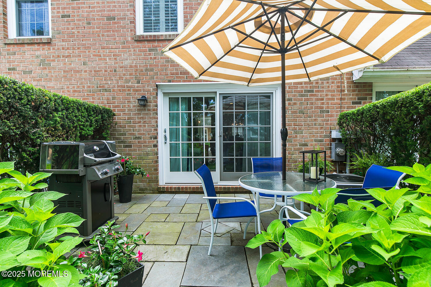 60 Wyckham Road Spring Lake Heights, NJ 07762 - Photo 25 of 26 a view of a house with backyard sitting area and garden