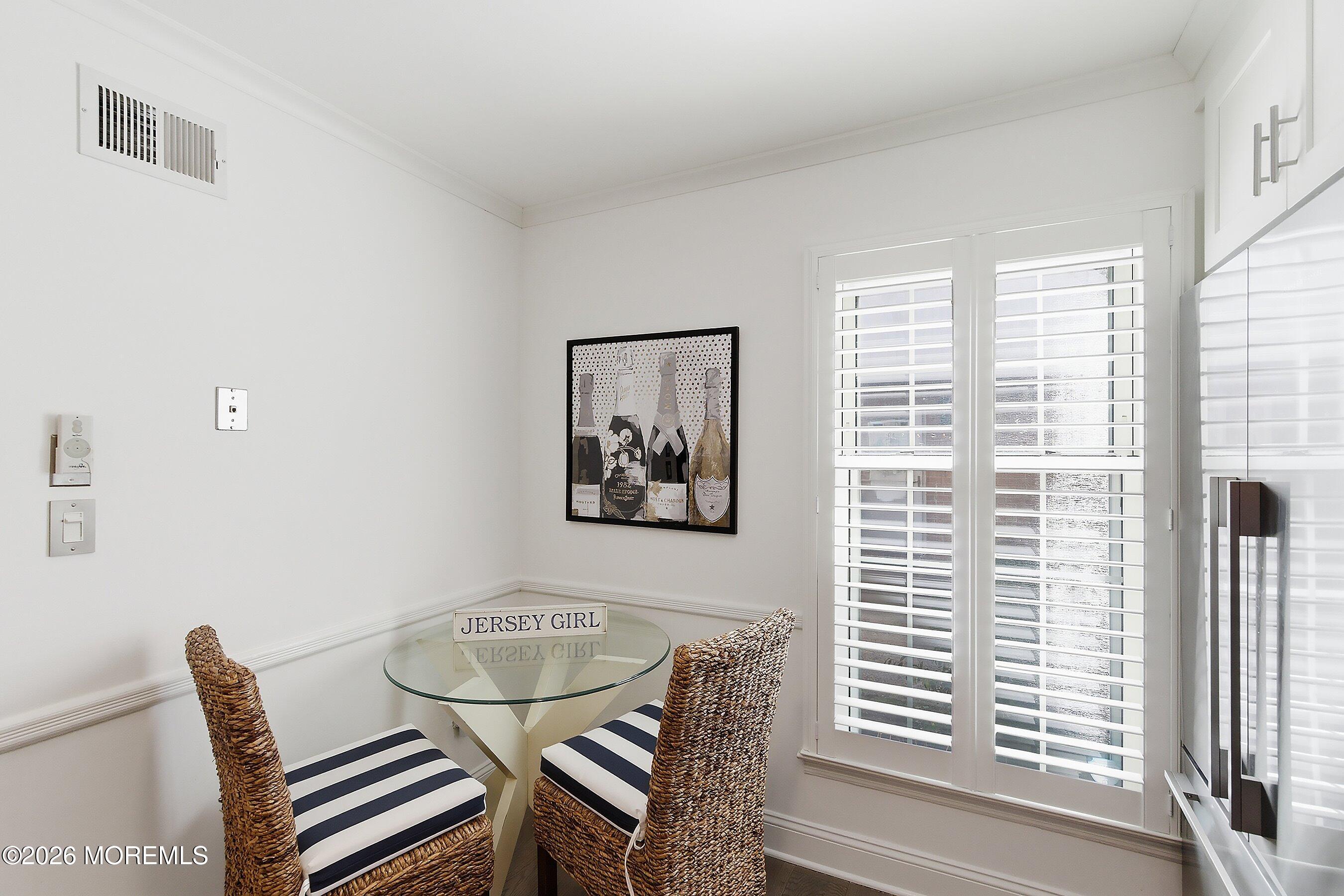 60 Wyckham Road Spring Lake Heights, NJ 07762 - Photo 5 of 26 a view of a dining room with furniture and a window