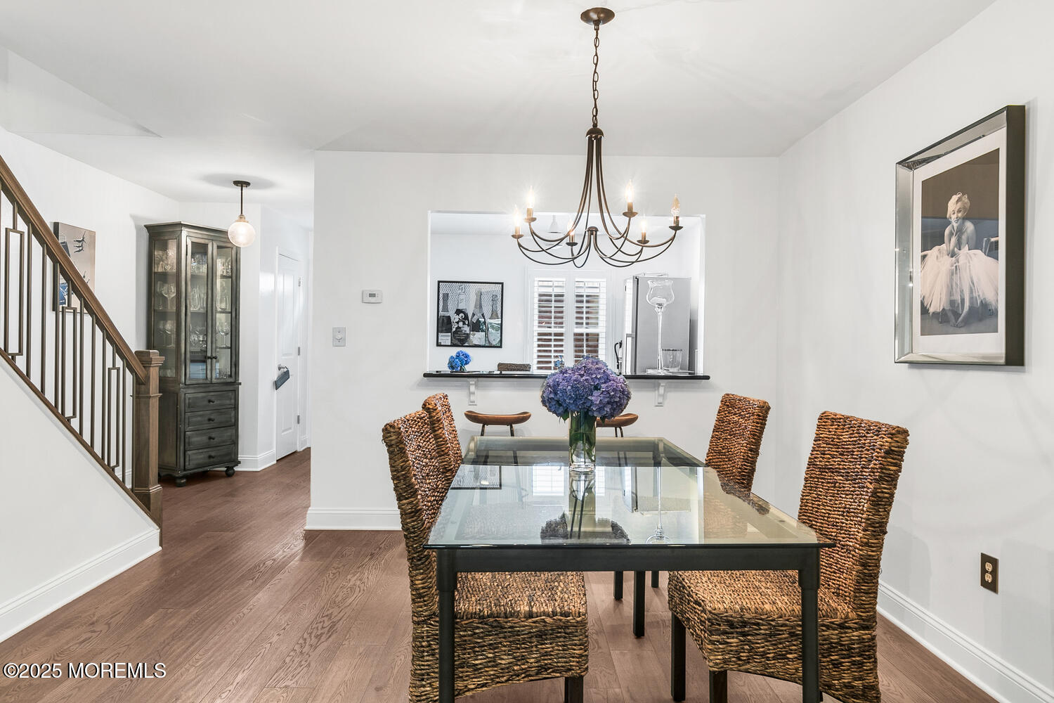 60 Wyckham Road Spring Lake Heights, NJ 07762 - Photo 9 of 26 a view of a dining room with furniture wooden floor and chandelier