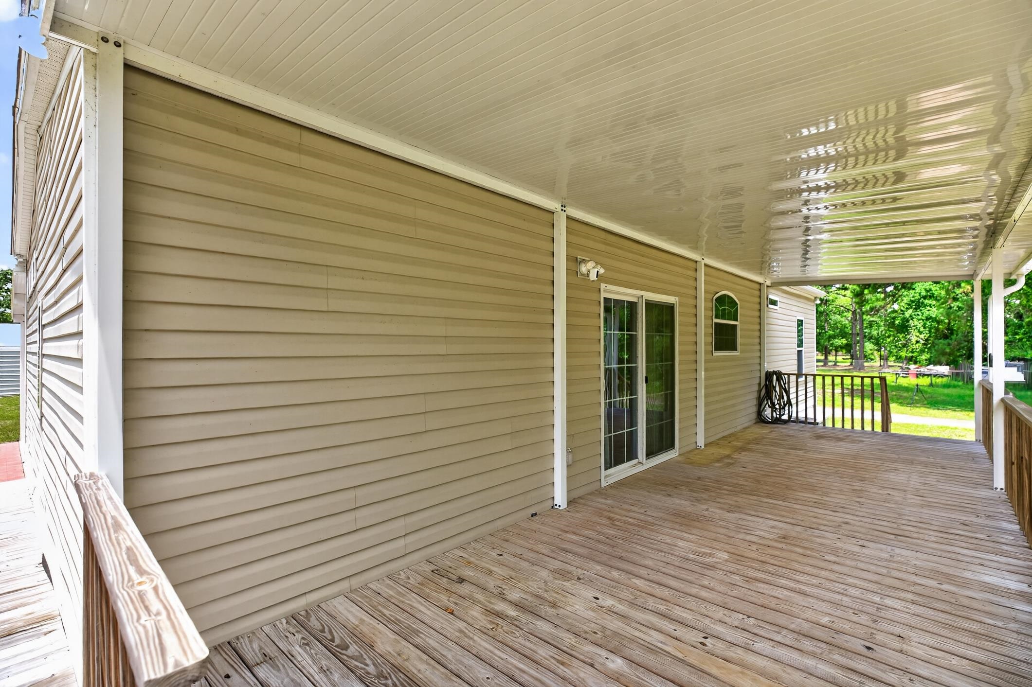 101 Trout Trail Crescent City, FL 32112 - Photo 21 of 45 a view of a porch with wooden floor