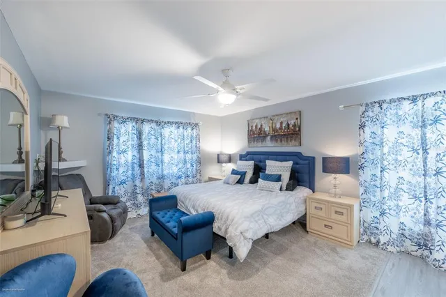 a bathroom with a sink and mirror with toilet