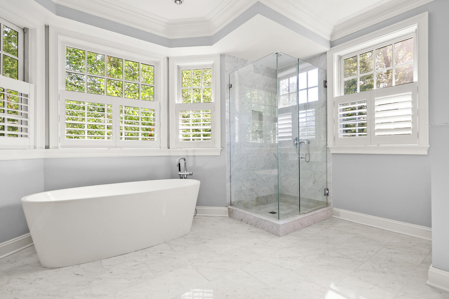 35 Logan Road New Canaan, CT 06840 - Photo 20 of 73 a bath tub sitting in a bathroom next to a window