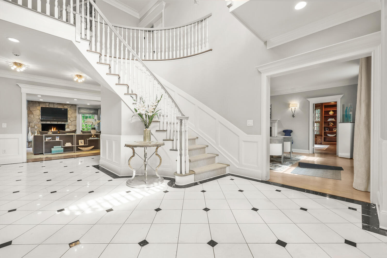 35 Logan Road New Canaan, CT 06840 - Photo 2 of 73 a view of entryway and hall with wooden floor