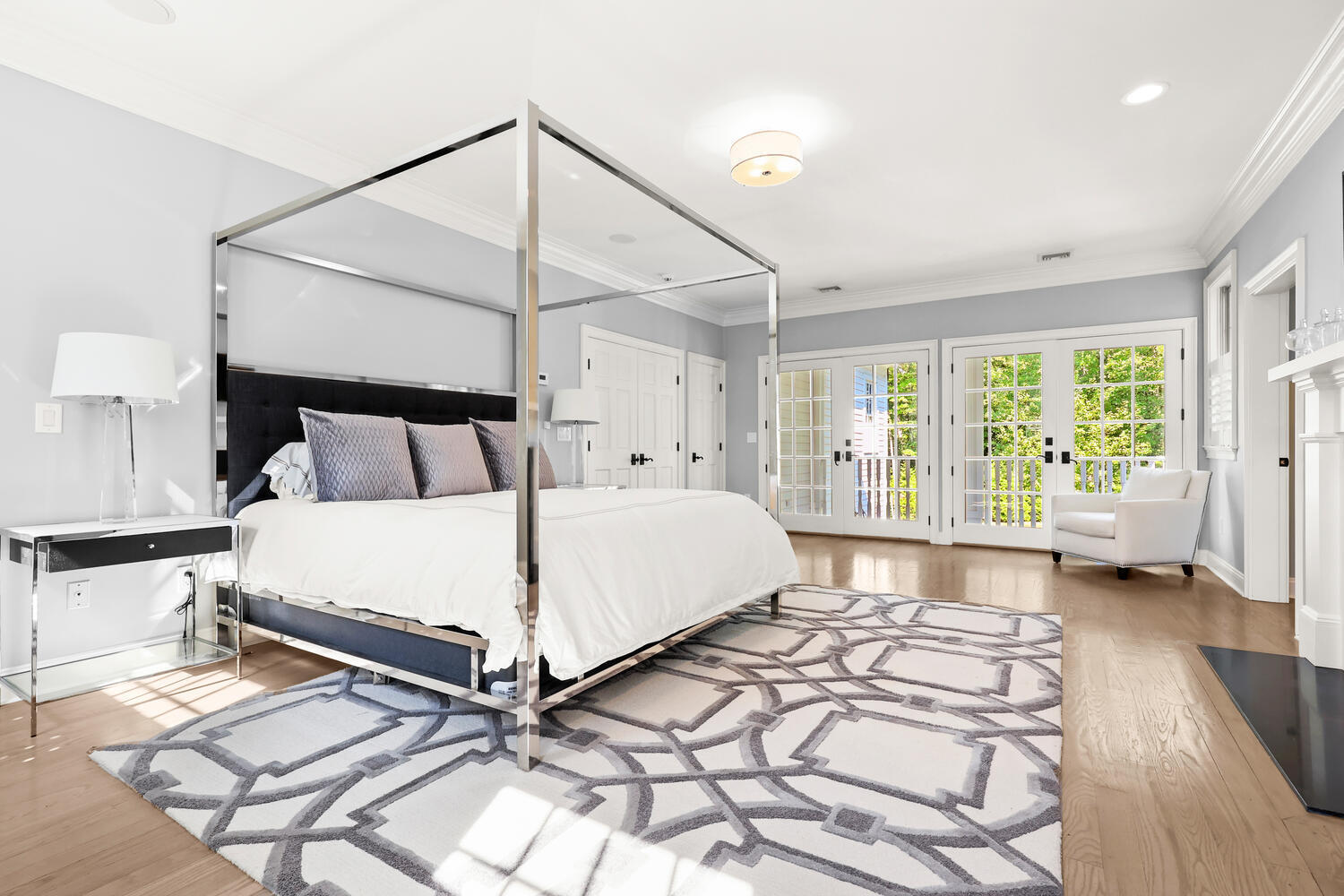 35 Logan Road New Canaan, CT 06840 - Photo 21 of 73 a bedroom with a bed and a large window