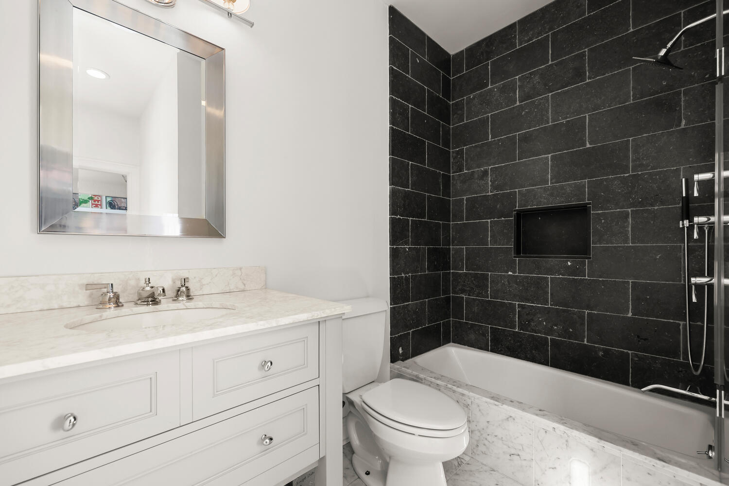 35 Logan Road New Canaan, CT 06840 - Photo 29 of 73 a bathroom with a sink a toilet a mirror and shower