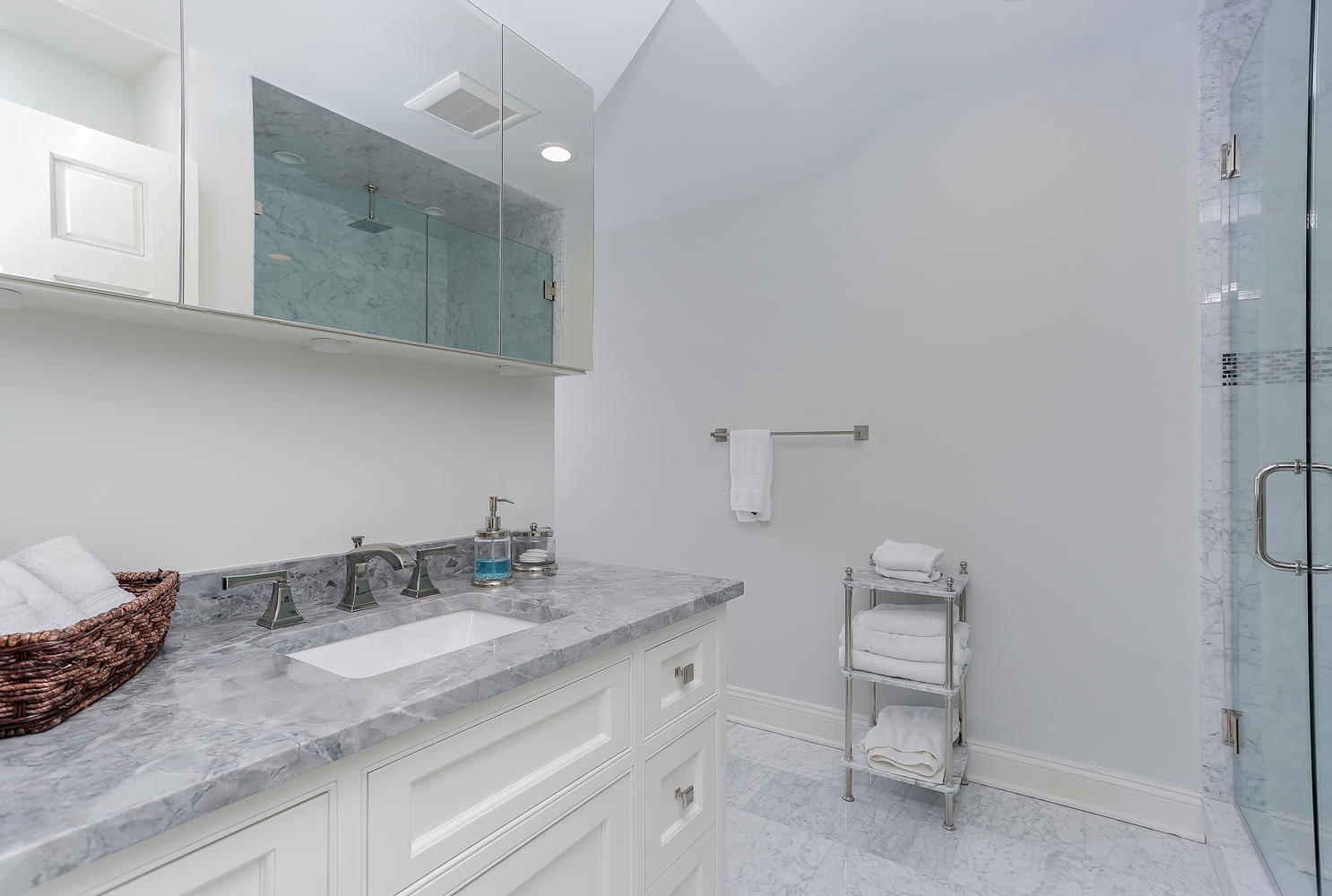 35 Logan Road New Canaan, CT 06840 - Photo 30 of 73 a bathroom with a granite countertop sink a toilet and a mirror