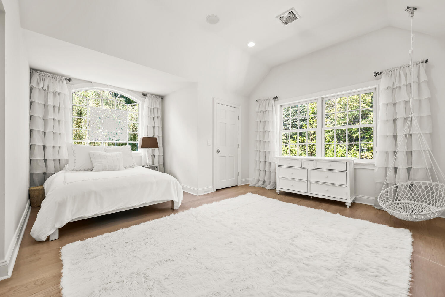 35 Logan Road New Canaan, CT 06840 - Photo 33 of 73 a bedroom with a large bed and a couch