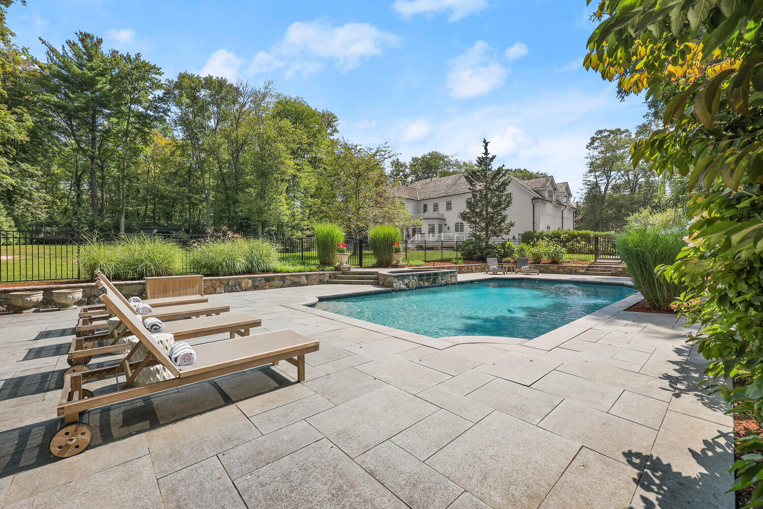35 Logan Road New Canaan, CT 06840 - Photo 42 of 73 a view of a terrace with a yard
