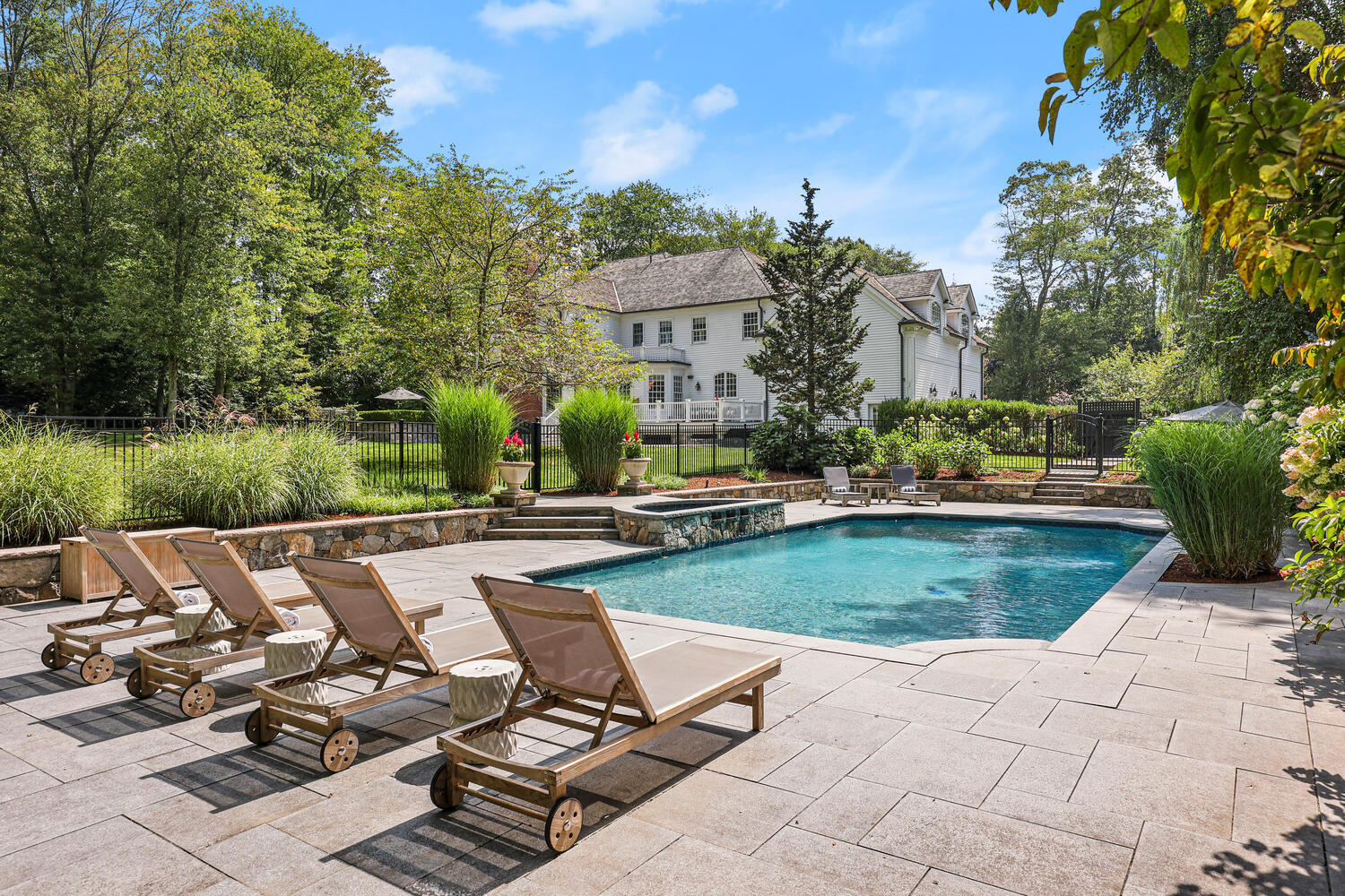 35 Logan Road New Canaan, CT 06840 - Photo 44 of 73 a view of a patio with chair and tables