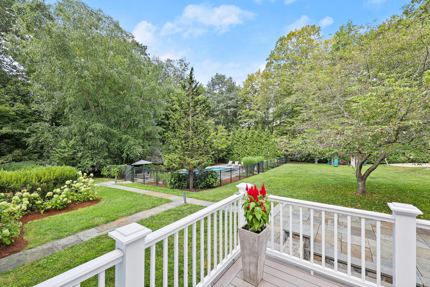 35 Logan Road New Canaan, CT 06840 - Photo 53 of 73 a view of a garden and deck