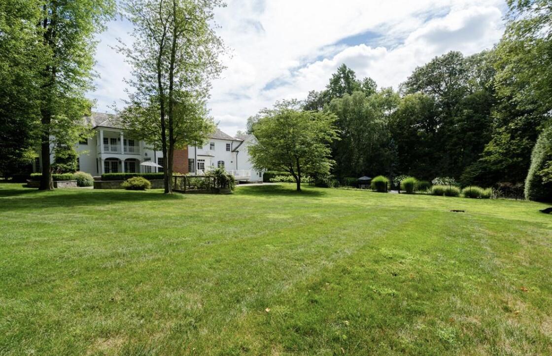 35 Logan Road New Canaan, CT 06840 - Photo 63 of 73 a view of a park with large trees