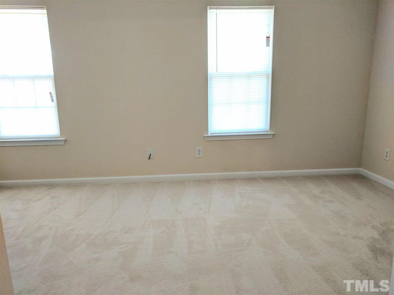 3124 Binghampton Lane Raleigh, NC 27604 - Photo 11 of 19 an empty room with a window