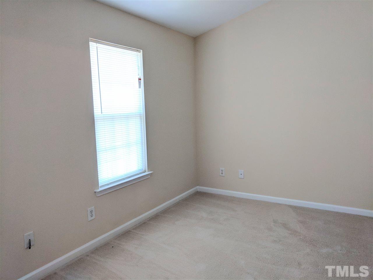 3124 Binghampton Lane Raleigh, NC 27604 - Photo 13 of 19 an empty room with a window