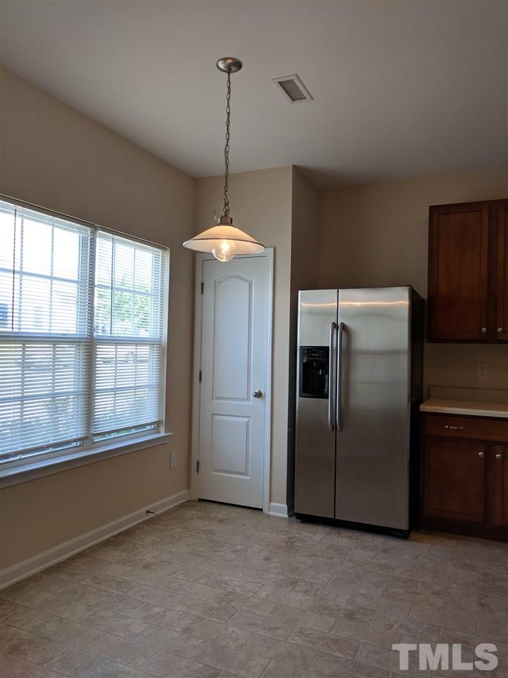 3124 Binghampton Lane Raleigh, NC 27604 - Photo 4 of 19 a view of an empty room with a window