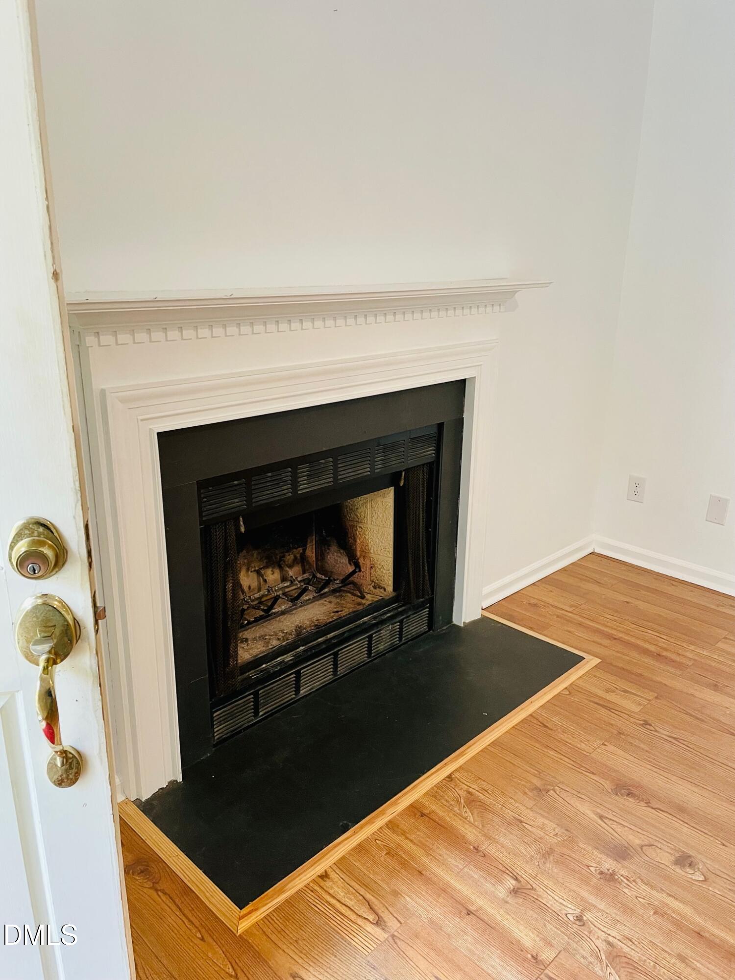 122 Winners Circle Cary, NC 27511 - Photo 4 of 14 a living room with a fireplace