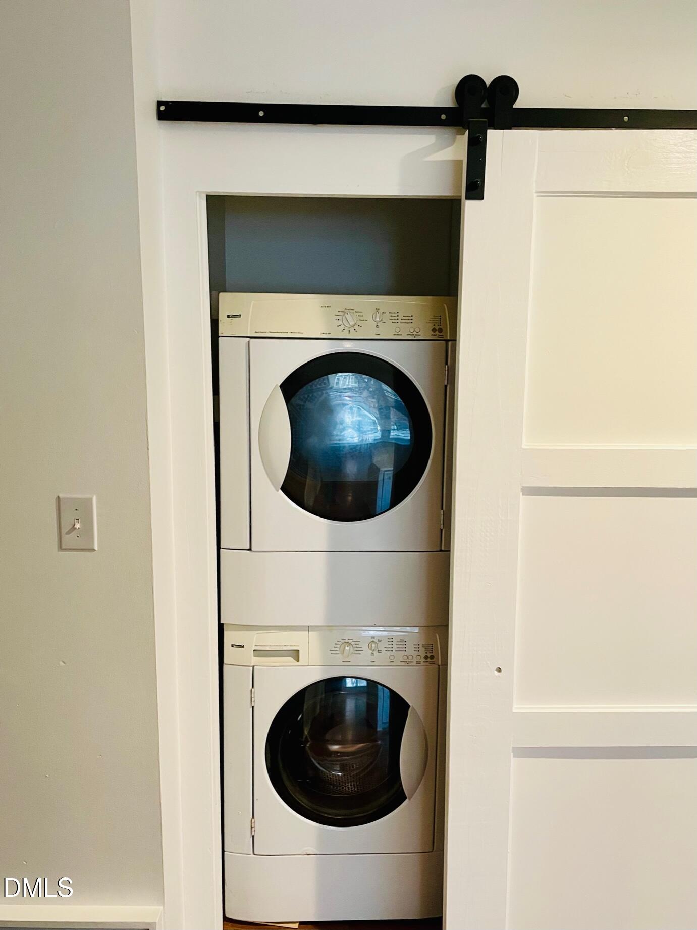 122 Winners Circle Cary, NC 27511 - Photo 7 of 14 a utility room with dryer and washer