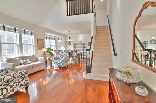 a living room with furniture fireplace and a flat screen tv