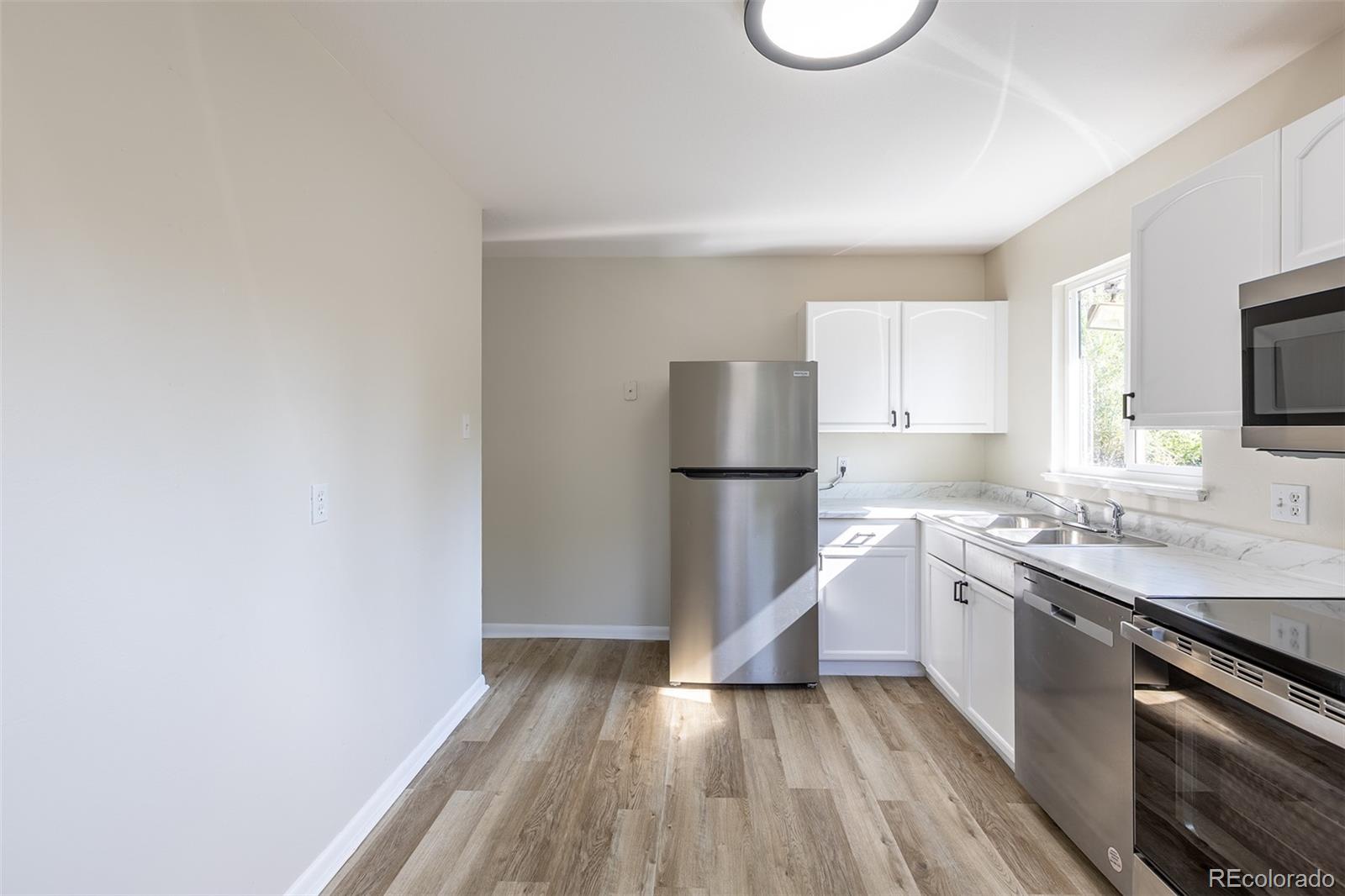 1544 South Clay Street Denver, CO 80219 - Photo 4 of 31