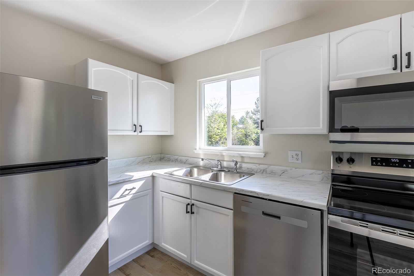 1544 South Clay Street Denver, CO 80219 - Photo 5 of 31