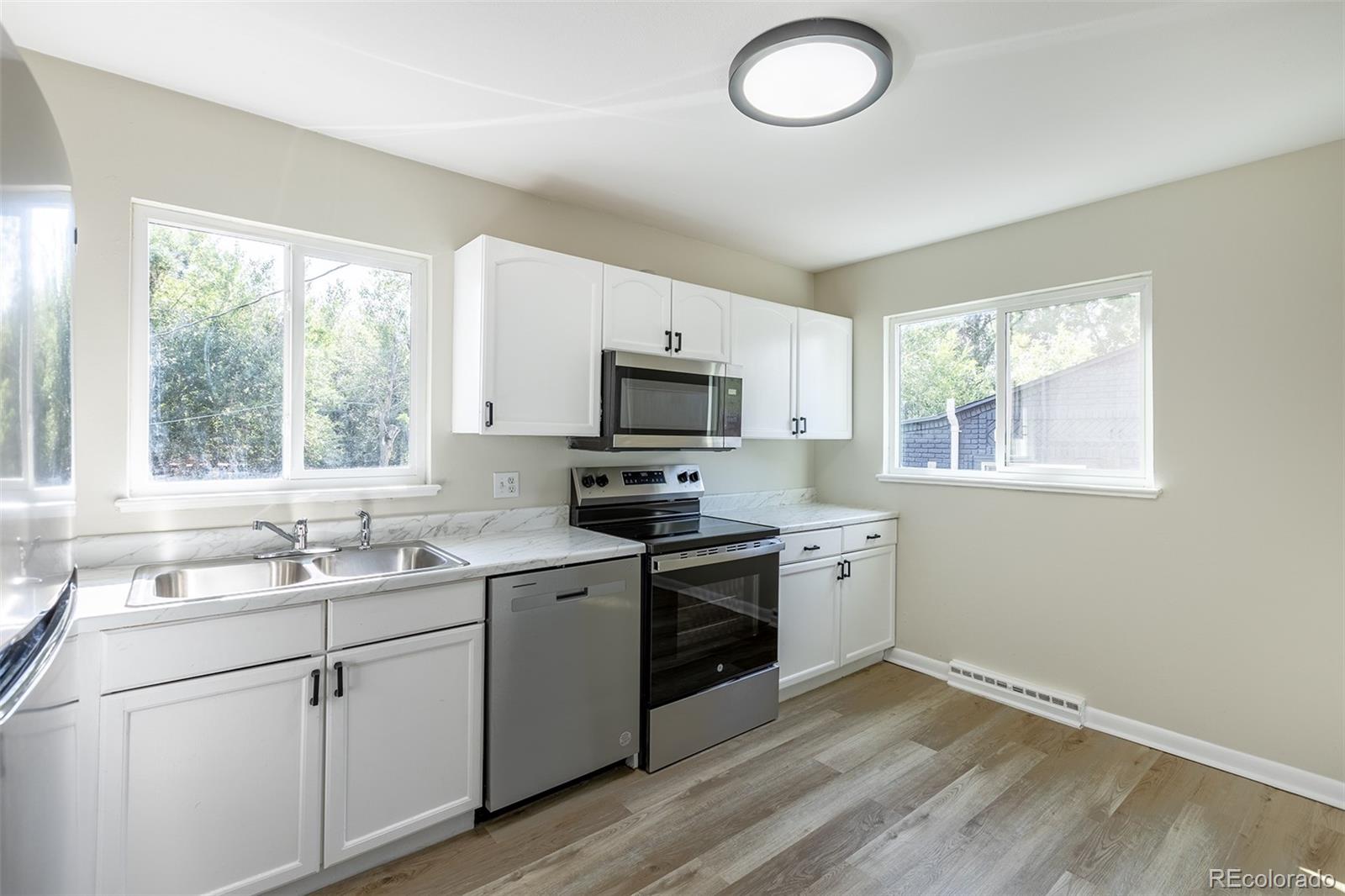 1544 South Clay Street Denver, CO 80219 - Photo 6 of 31