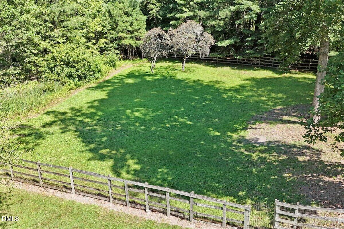 2129 Kelly Road Apex, NC 27502 - Photo 51 of 64 a view of an outdoor space and deck