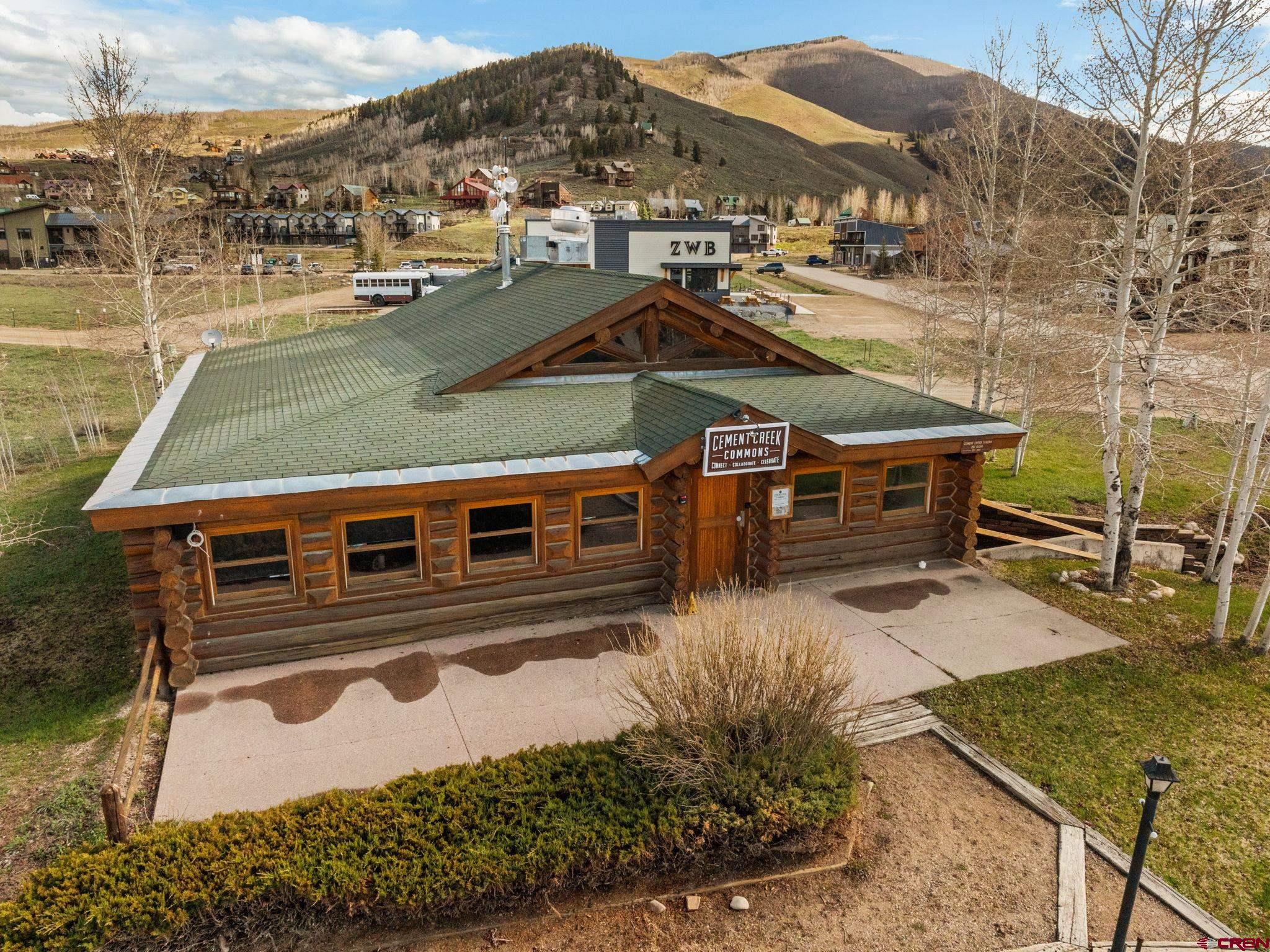 207 Elcho Avenue, Unit 14 Crested Butte, CO 81224 - Photo 1 of 34 a view of a house with a yard