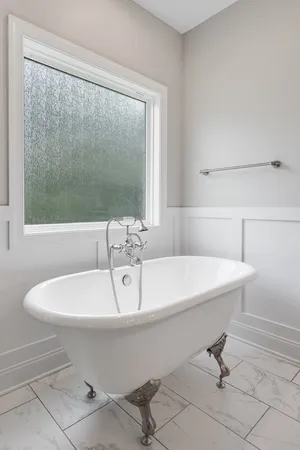 a bathroom with a sink and a bathtub