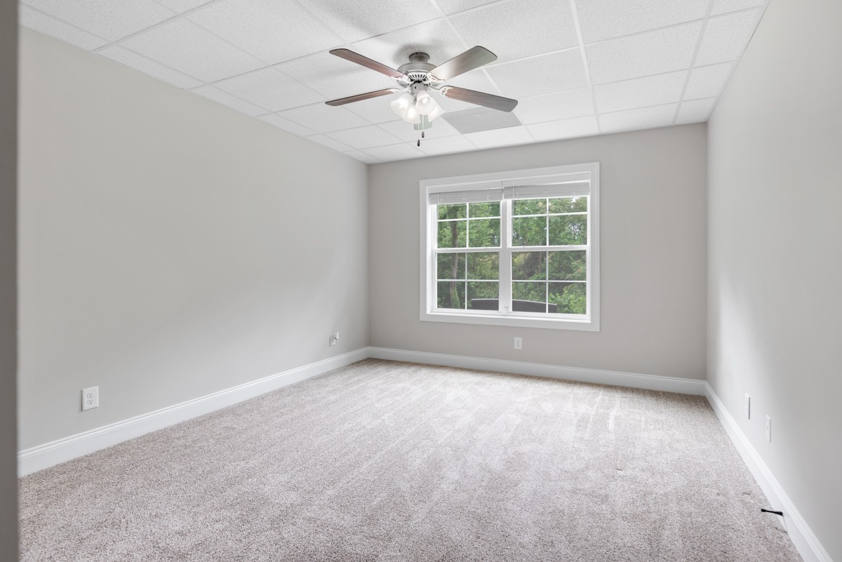 488 Sheas Way Clarksville, TN 37043 - Photo 30 of 39 an empty room with window and ceiling fan