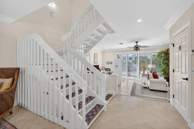 a living room with furniture or couch and a large window